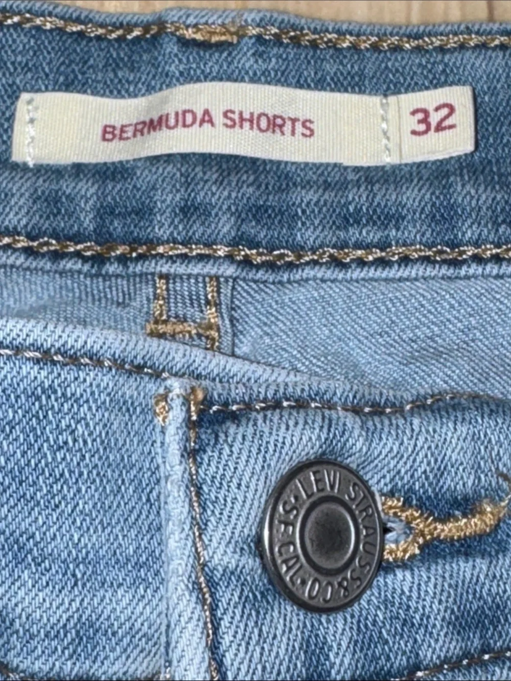 Levi's Light Blue Frayed Hem Denim Shorts